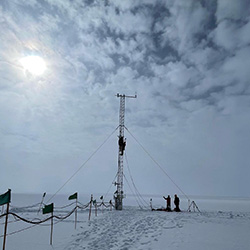 Support staff relocate scientific instruments on the Meteorological Tower at Summit Station, a research outpost on Greenland’s ice sheet that is funded by NSF in cooperation with the Government of Greenland. 