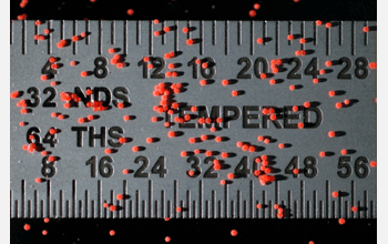 Healing agent containing microcapsules used in self-healing polymers