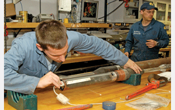 Extracting cores just drilled from the ocean floor