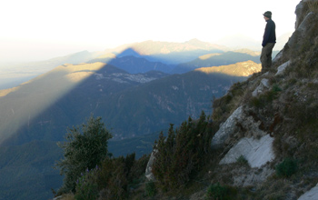 Graduate student Richard Sanderson enjoys the sunrise from the summit of Santa Maria