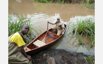 Researchers take pond samples in Karen Suburb of Nairobi, Kenya