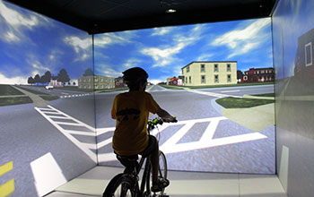 Simulator studies factors that put children at risk crossing the street