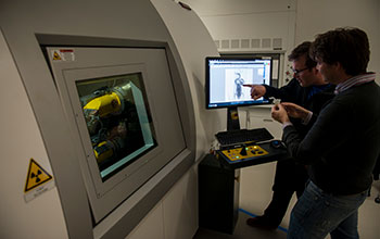 Ed Stanley (right) and David Blackburn comparing CT scan of African clawed frog