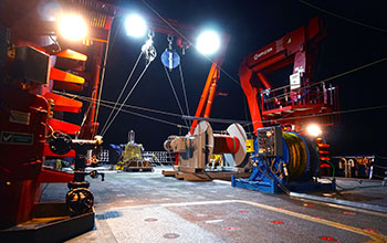 Equipment on the aft deck of the R/V <em>Sikuliaq</em>