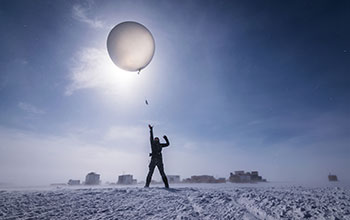 Launching a radiosonde at Summit Station, Greenland