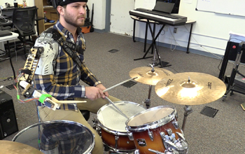 man palying the drums