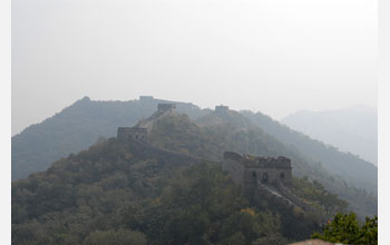 Great Wall of China near Beijing obscured by air pollution, dust and sand