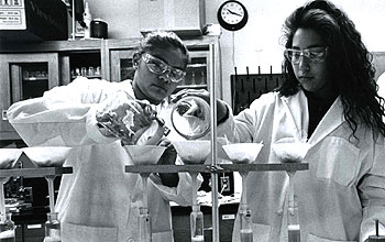 Native American high-school students work in plant and soil lab while participating in HOIST program