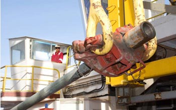 Photo of scientists preparing to drill into the sea-floor crust in the equatorial Pacific Ocean.