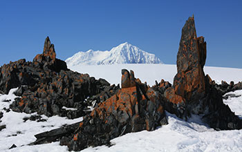 Mount William in the distance, as viewed from Torgersen Island near the Antarctic Peninsula