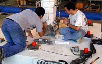 Tests to study the properties of concrete columns and how they endure in earthquakes