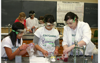 Photo of girls from the Expanding Your Horizons Conference enjoying a hands-on workshop.