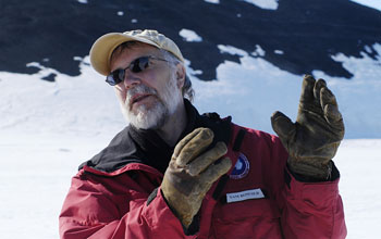 Explaining how light on an uneven ice surface overhead obstructs view for divers below