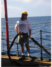 Researcher Sean Gulick works to set up experimental equipment in the Indian Ocean off Sumatra.