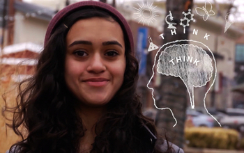 a girl and a graphic showing a human braid and the word think