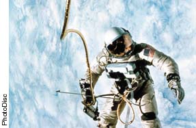 Image of an astronaut on a space walk. Photograph from PhotoDisc