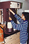 a graduate student measures the surface area of a pharmaceutical powder